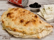 עסקית קלצונה יוונית עסקית קלצונה יוונית פיצה כמעט חינם ראשון לציון