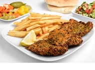 עסקית שניצל עשבי תיבול במגשית עסקית שניצל עשבי תיבול במגשית שניצל קוקי קרית מטלון