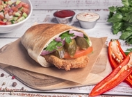 שניצל פסטו עשבי תיבול בפיתה שניצל פסטו עשבי תיבול בפיתה רוסטר רעננה