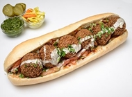 פלאפל ג'ינה בבאגט פלאפל ג'ינה בבאגט פלאפל ג'ינה מנחם בגין תל אביב