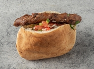 מרגז בפיתה מרגז בפיתה שווארמה סטריט אלנבי תל אביב