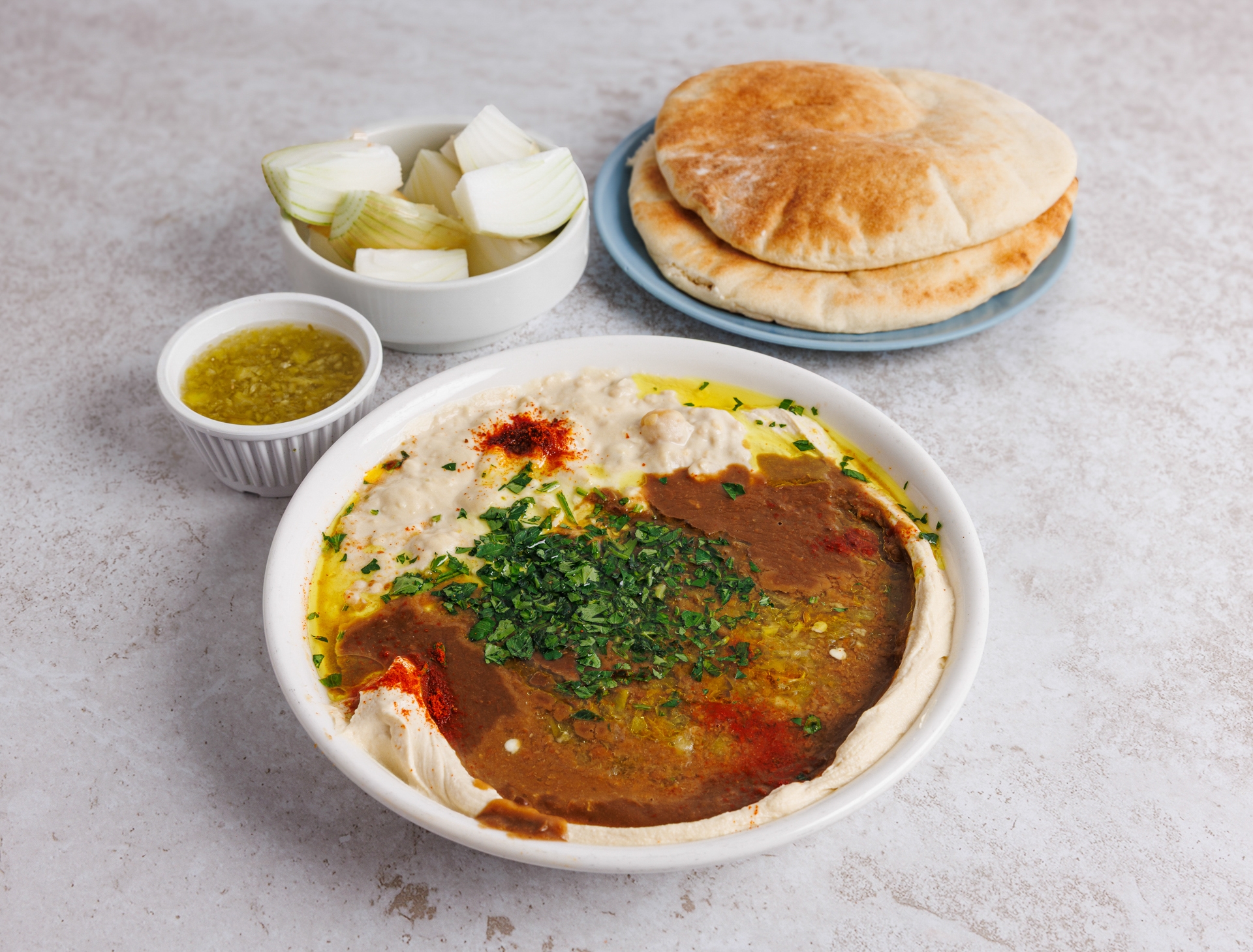 משולש בצלחת חומוס פול אבו חסן יפו