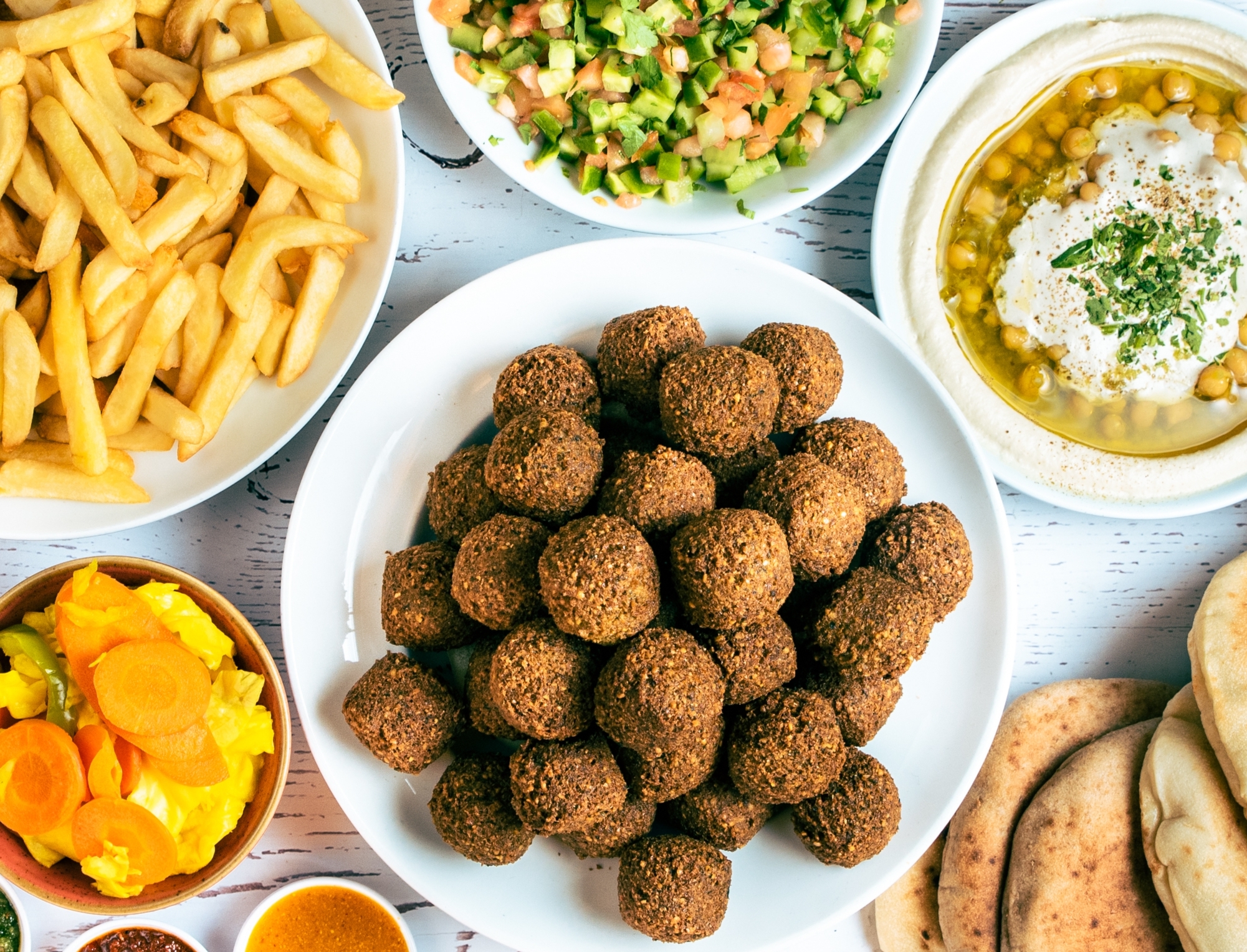 בופה סביח ל 10 סועדים פלאפל ג'ינה שוקן תל אביב