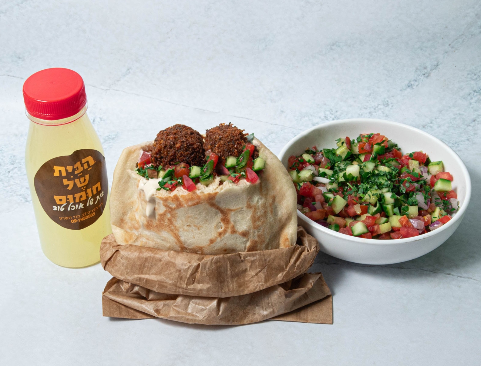 עסקית בפיתה הבית של חומוס הוד השרון