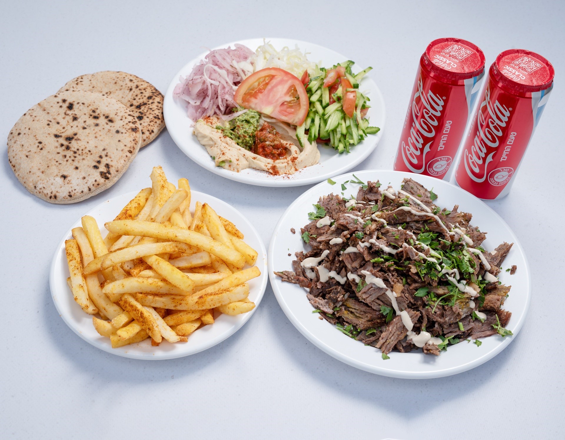 עסקית צלחת שווארמה זוגית + 2 פחיות שתייה + צ׳יפס שווארמה אדם בעיר חיפה