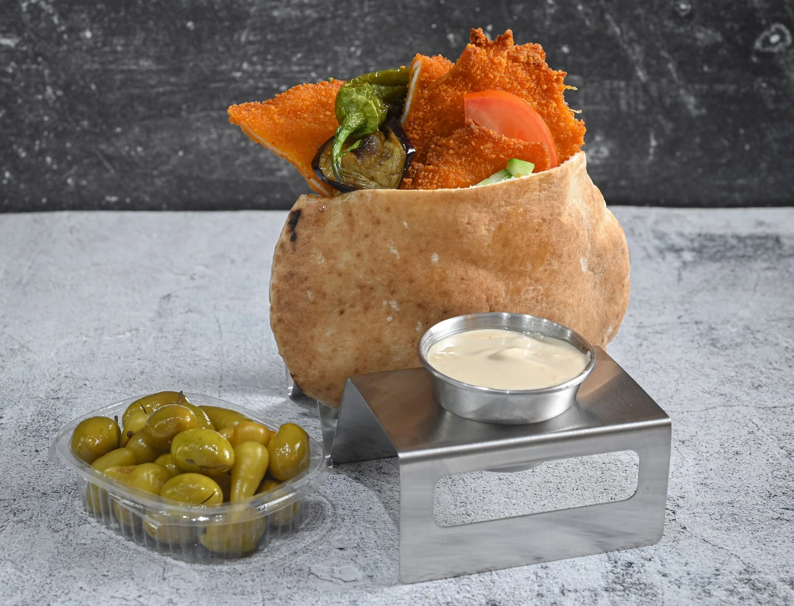 שניצל בפיתה  השניצל של תומר נהריה